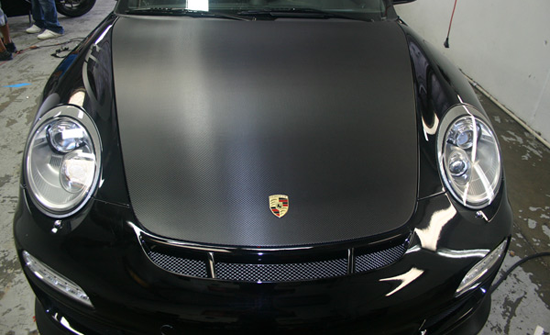 black Porsche vehicle wrap